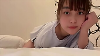 Tiny Asian Girl'S Solo Sex Show With White Pajamas And Cute Smile