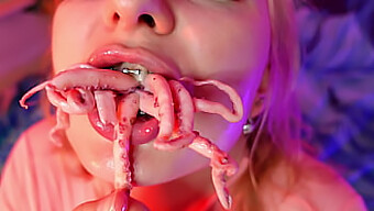 Unusual Video Of Arya Grander Chewing On Octopus And Braces